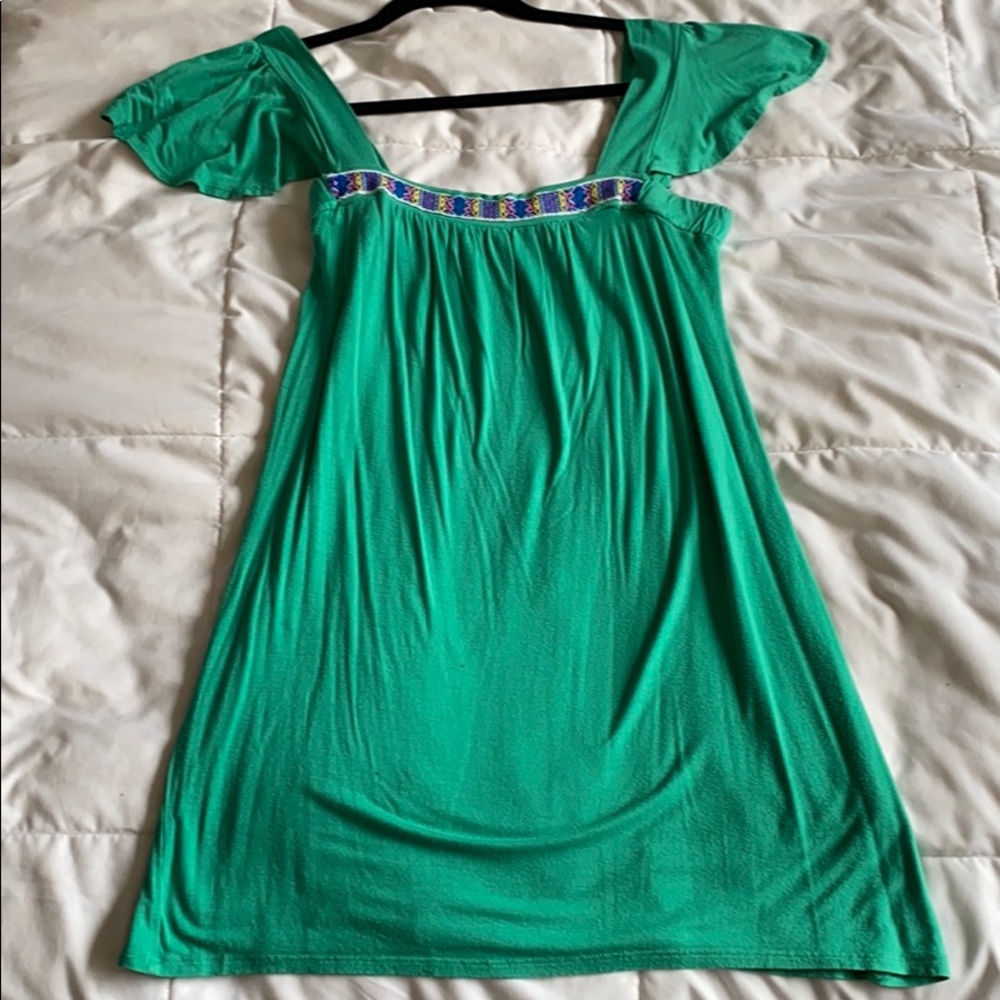 Sheer green dress with embroidered band